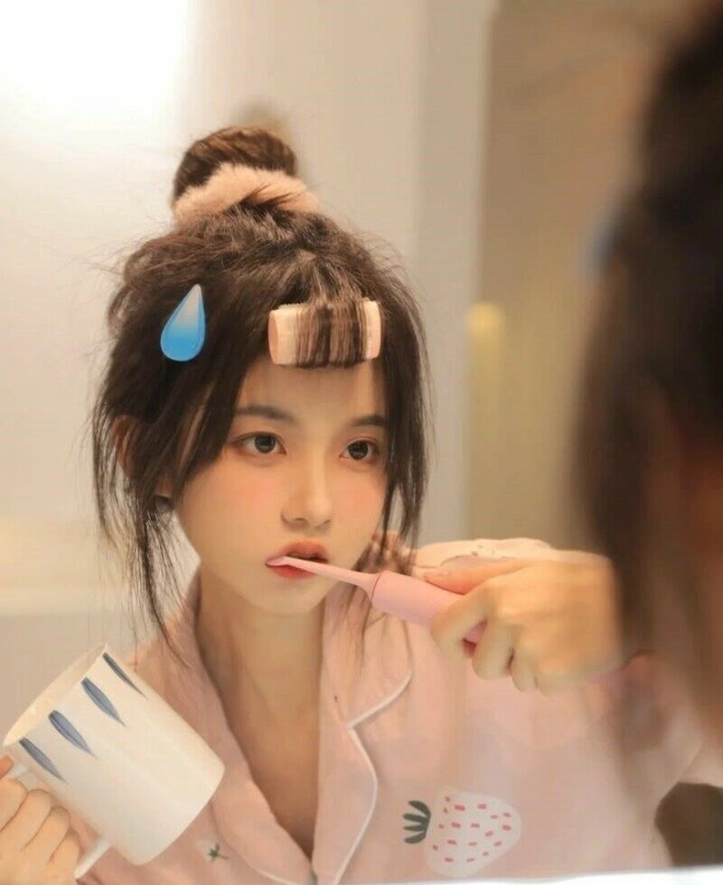 ảnh gái xinh búi tóc