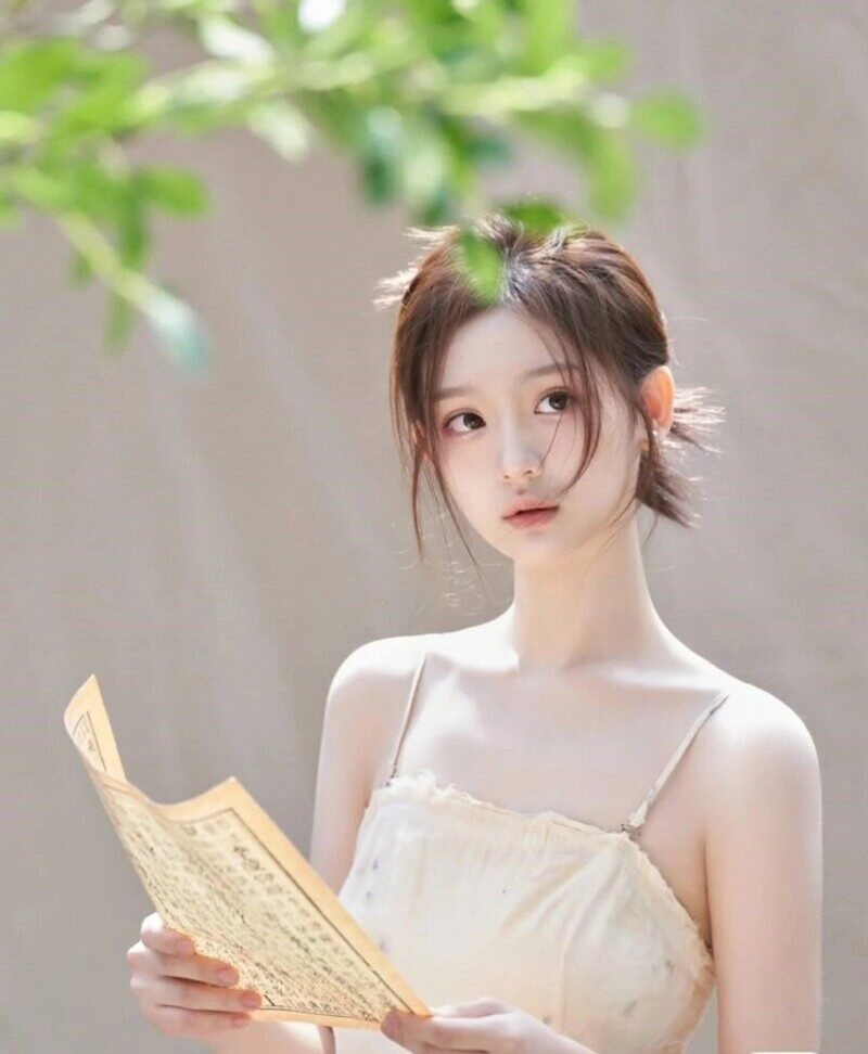 ảnh gái xinh búi tóc