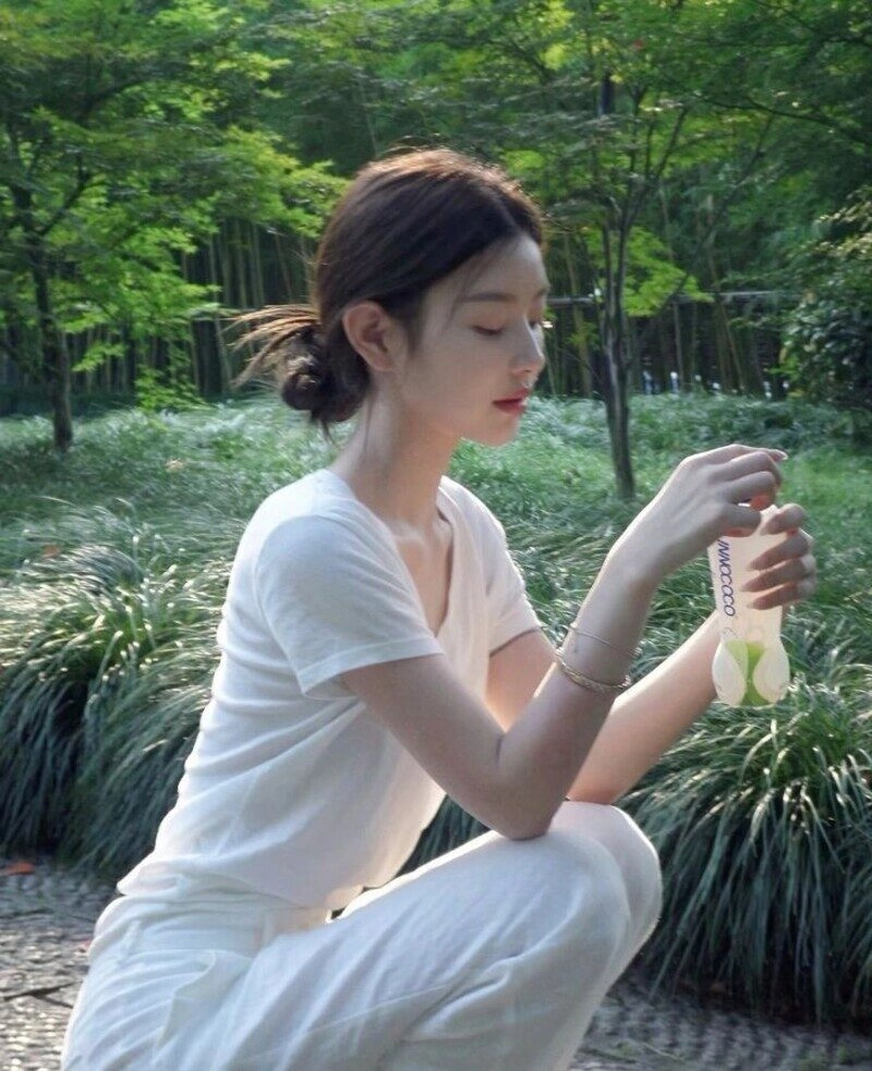 ảnh gái xinh búi tóc